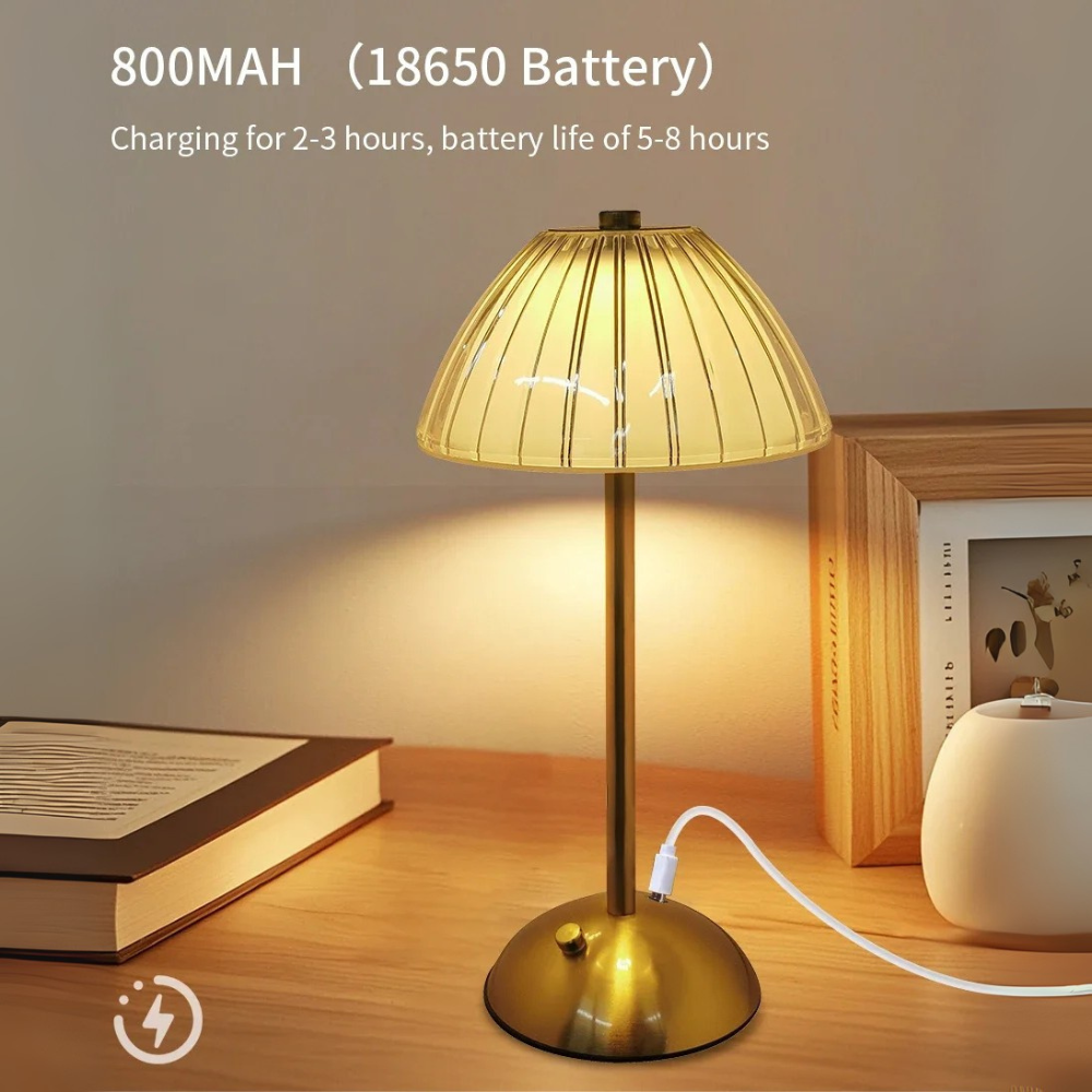 Lámpara de mesa recargable dorada