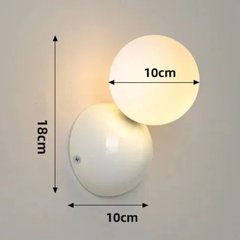Aurea Wall Sconce In Cream Finish With Frosted Glass Ball Shade