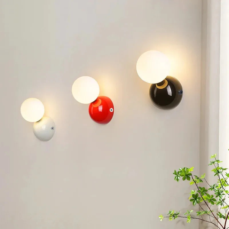 Aurea Wall Sconce In Cream Finish With Frosted Glass Ball Shade